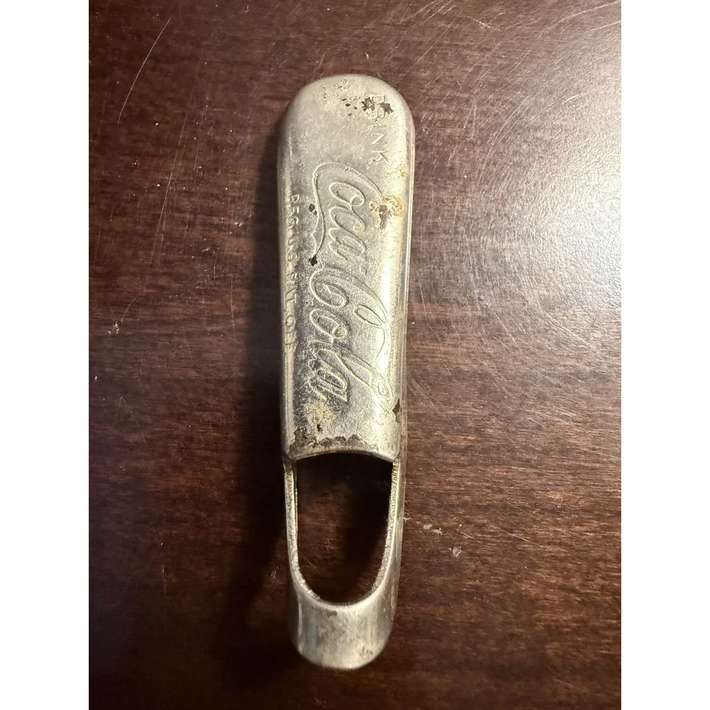 Vintage 1930's Coca Cola Metal Bottle Opener Consolidated Cork Corp Collectible